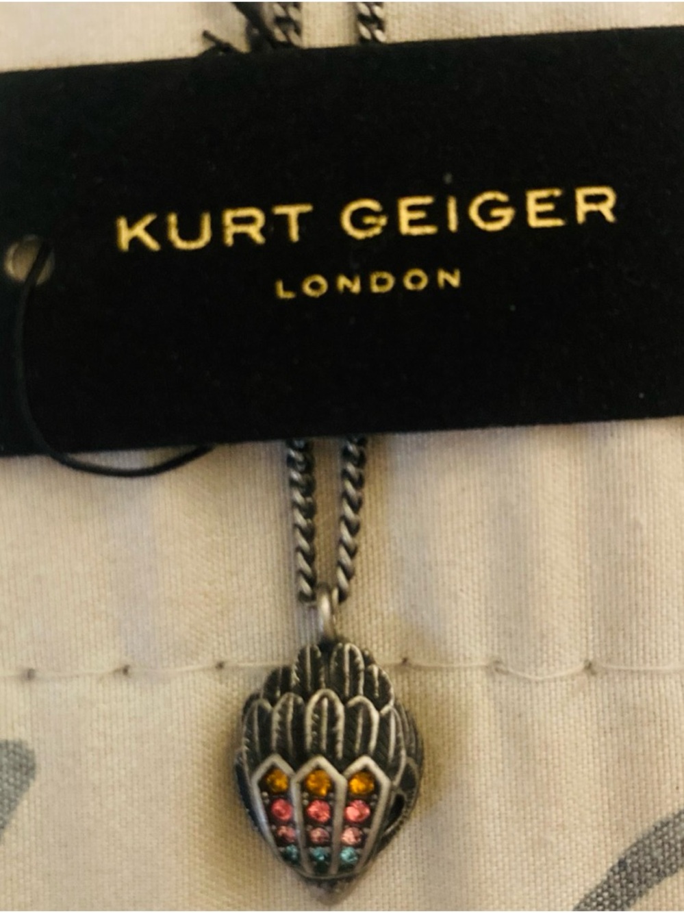 Kurt Geiger Silver Wing Pendant Necklace with Pink, Yellow and Blue Stones